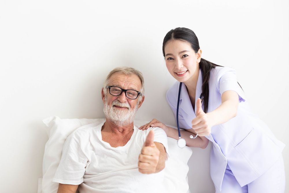 An older man and his young doctor each give a thumbs up regarding HSA accounts | Investment U 