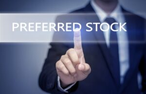 A businessman touches a screen that says "preferred stock"