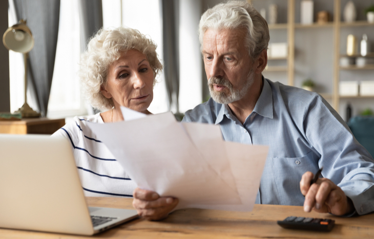 An older couple looking at the most common retirement age